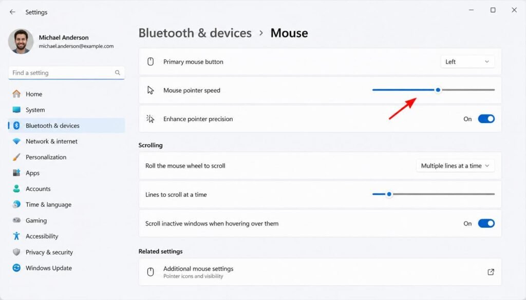 Windows 11 mouse settings screen showing Pointer speed slider under Bluetooth and devices menu for adjusting cursor movement sensitivity

